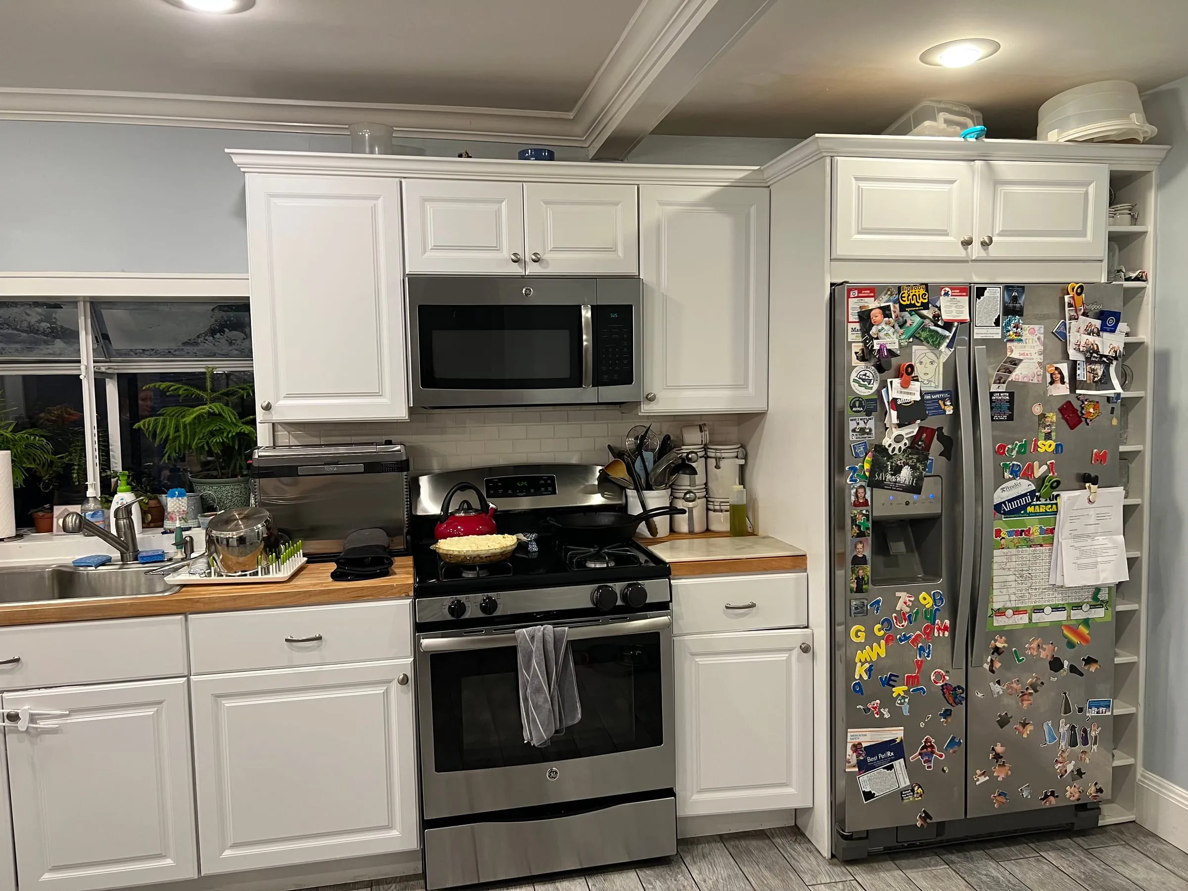 Before: A dated range wall to charcoal and stone