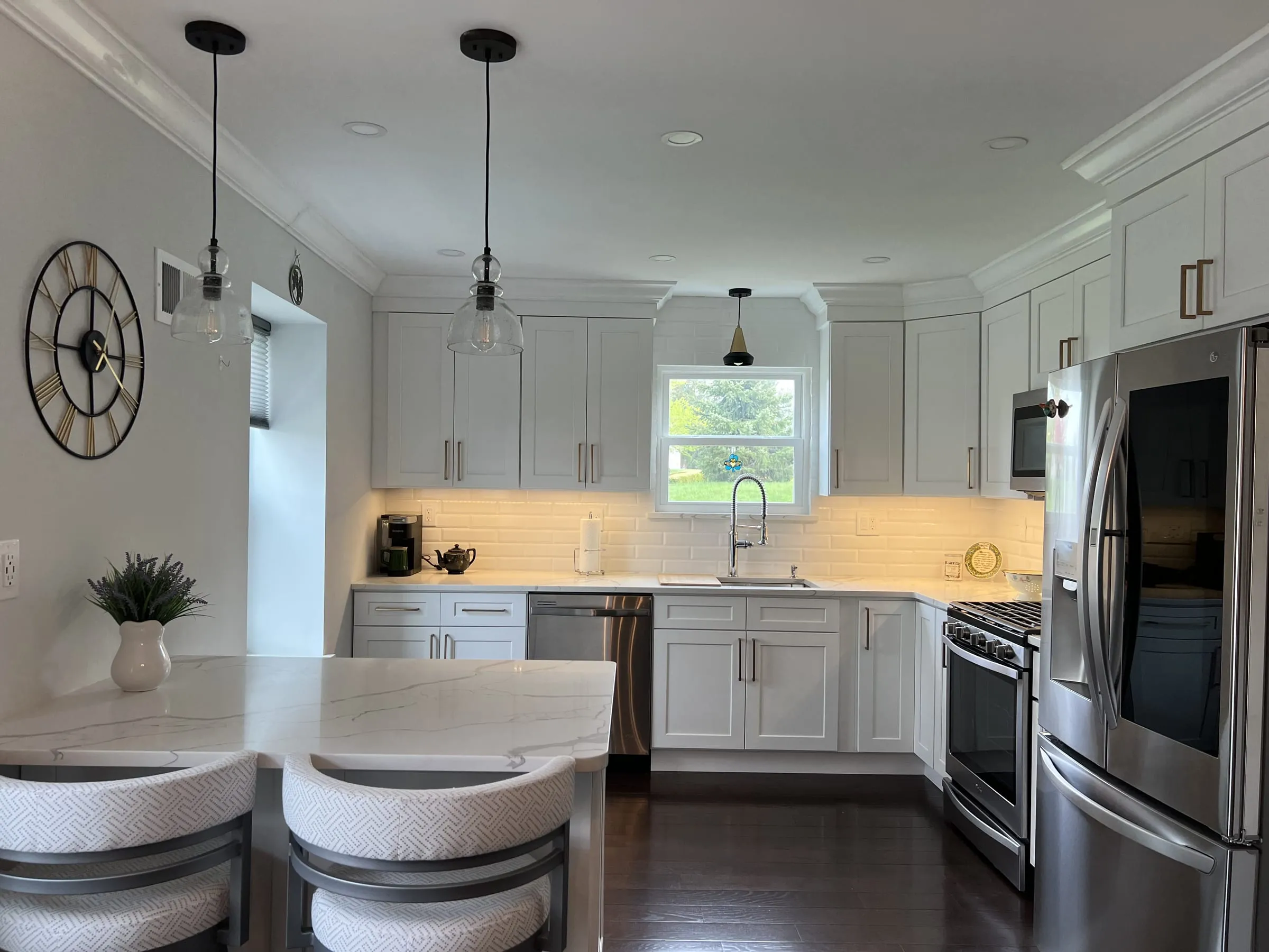 After: Oak cabinets to white shaker